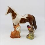 Beswick; Three John Beswick pieces to include; bay and grey pinto horse, ginger tom and gold finch