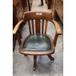 One 1930's desk chair, with green leather seat