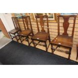 Four oak George II chairs.