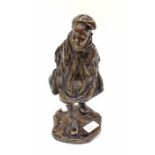 Bronze figure of a school boy with a cross body bag on him. Signed to base, with impressed foundry