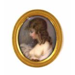 An Associated Georgian portrait miniature, painted on Ivory, scantily clad Lady The circular mount