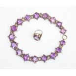 An early 20th century amethyst and unmarked white metal necklace, probably silver, comprising