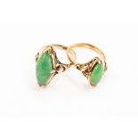 Two 14ct gold and nephrite jade set rings, comprising a  marquise cut jade set version within a