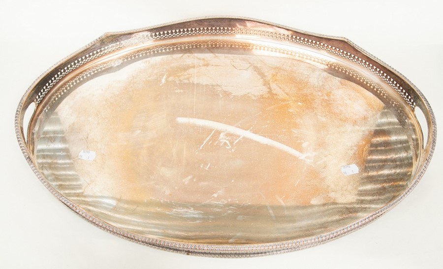 A large Edwardian style large oval plated tray, wavy openwork gallery with integral handles, 62cm