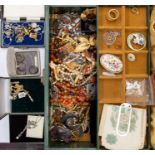 A collection of costume jewellery to include vintage brooches, marcasite end paste versions, money