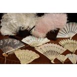 A collection of small and miniature fans, different types some ivorine