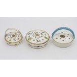 Three Continental porcelain pen pots, two examples with hand painted floral decoration