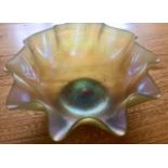 A Louis Comfort Tiffany (1848 - 1933) glass bowl of Favrile (handmade) glass with scalloped rim