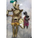 Two Continental puppet character dolls including a golden knight and Samurai warrior