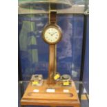 An Edwardian desk clock, mounted on ink stand with silver collars