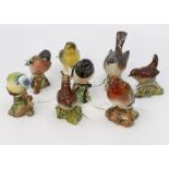 Beswick birds to include blue tit, wren, robin, stonechat, white throat etc (8)