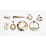 A collection of vintage silver items to include a Charles Horner pendant, a Victorian silver Buckle,