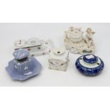 Assorted ceramic Continental inkwells, one in the form of a sleigh and another in Rococo style