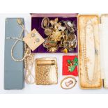 A collection of costume jewellery to include  vintage paste set brooches, faux jade pendant and