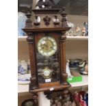 A late 19th Century mahogany German wall clock