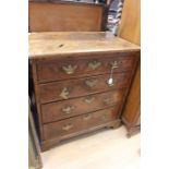 A George I walnut chest of drawers, comprising brushing slide over four drawers, having