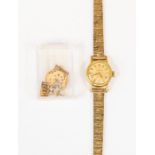 A 9ct gold cased ladies Omega wristwatch  with original 9ct textured strap (dial A/F) with