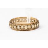 A stone set eternity ring, possibly white quartz, 9ct gold, size S, total gross weight approx 3gms