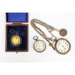 A silver pocket watch, open face, subsidiary dial, on a silver Albert chain and peace medallion,