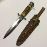 A post war German made hunting knife with stainless steel double edged 14cm blade by "Anton