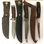 A collection of three general purpose hunting knives: one Finnish knife by "Normark" with 16cm