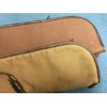 Two padded canvas gun slips with leather trim and slings, one by Holland and Holland (zip puller