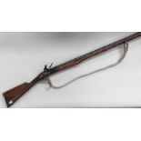 Flintlock Musket with 45.5 inch barrel. BP Proof mark. Action a/f. Overall length 61.5 inches. Brass