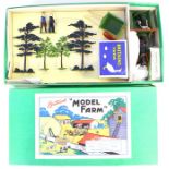 Britains: A boxed Britains Model Farm, No. 132F, in excellent condition; together with wooden