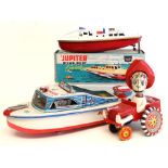 Tinplate: A boxed Sutcliffe Jupiter Ocean Boat, unused with box and key; together with a Marusan