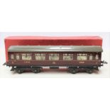 Hornby: A boxed Hornby O Gauge Number 2 Corridor Coach.