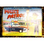 Peter Pan: A boxed Peter Pan 'Police Patrol' Action Game and Toy, unchecked for completeness, Made