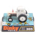Dinky: A bubbled Dinky Toys, David Brown Tractor, 305, mint condition, all original packaging.
