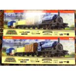 Hornby: A pair of boxed 'The Blue Highlander' train sets, R1101; both missing trackside accessories,