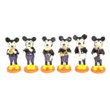 Mickey Mouse: A wooden, hand painted, six piece Mickey Mouse band. (6)