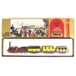 Trix: A boxed Trix Der Adler HO Scale locomotive, tender and three coaches.