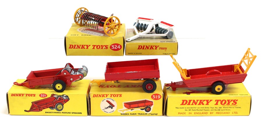 Dinky: A collection of five boxed Dinky Toys Farm vehicles to comprise: Harvest Trailer 320, Disc