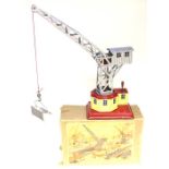 Geli: A boxed, 1940's, possibly Geli, tinplate clockwork crane, German, working order, no key,