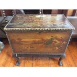 An 18th Century oak painted blanket chest on stand, in a Chippendale manner, painted detail of