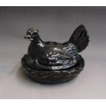 A 19th Century Jackfield hen on nest with applied gild decoration circa 1860, 15cm high, 15.5cm