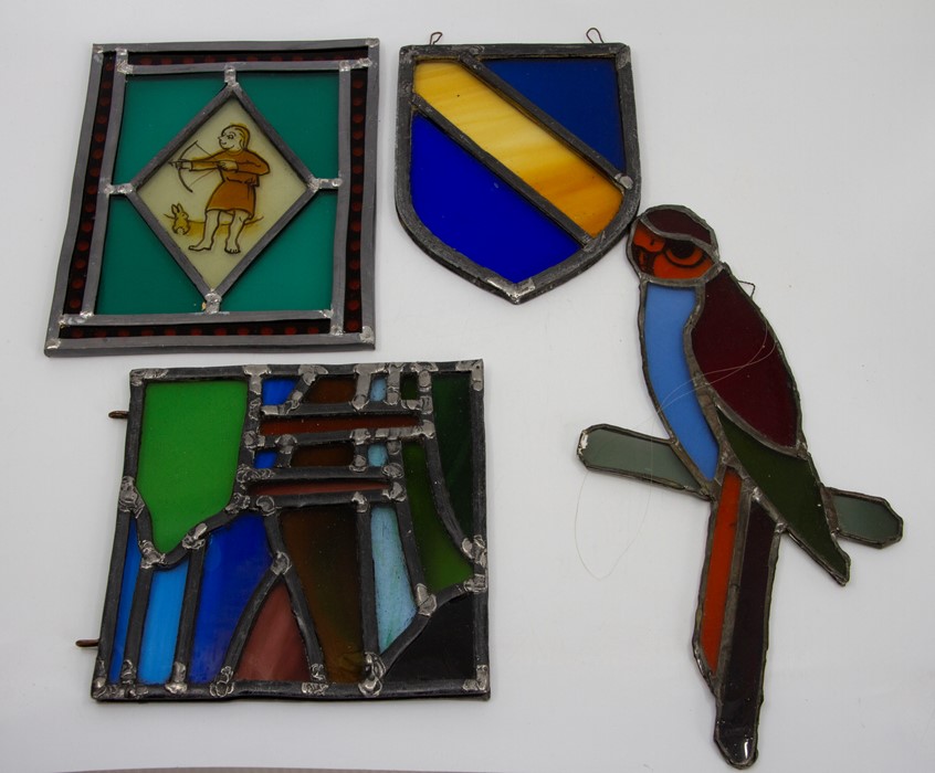 A series of panels of leaded stained glass by Sheila Willford, designs to include four oval portrait