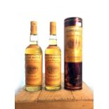 Two bottles of Glen Morangie 10 years old Single Highland Malt Scotch Whisky. Both bottles dating