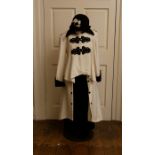 A cream wool reproduction 1920's style jacket with black cuff, & Coskick style frog and toggle