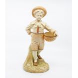 A Royal Worcester blush ivory figure modelled by James Hadley, by with a basket, No.1388, height