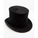 A late Victorian imperial Christys London silk top hat complete with leather hat box