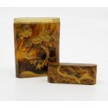 A Japanese horn calling card case, Meiji period, 1869-1912, decorated in gilt with exotic birds in