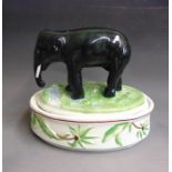 A rare Staffordshire elephant tureen and cover, circa 1860, 21cm high  23cm wide Condition: chip