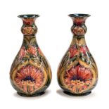 A pair of large Moorcroft Macintyre baluster vases, early 20th Century, of baluster form with flared