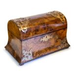 A Victorian burr walnut tea caddy, circa 1860, domed cover, outswept base, pierced brass Gothic