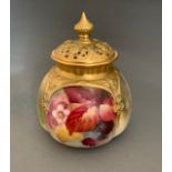 A Royal Worcester vase and cover painted with autumnal leaves and berries, shape 175/h, signed Kitty