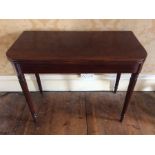 A George III mahogany inlay tea table, circa 1780, a folding twisted rectangular curved edge top